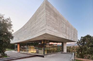 The Oak House Is a Concrete and Glass Home With Floating Levels